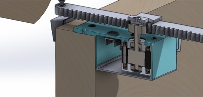Section view of a rack and pinion driven carriage assembly